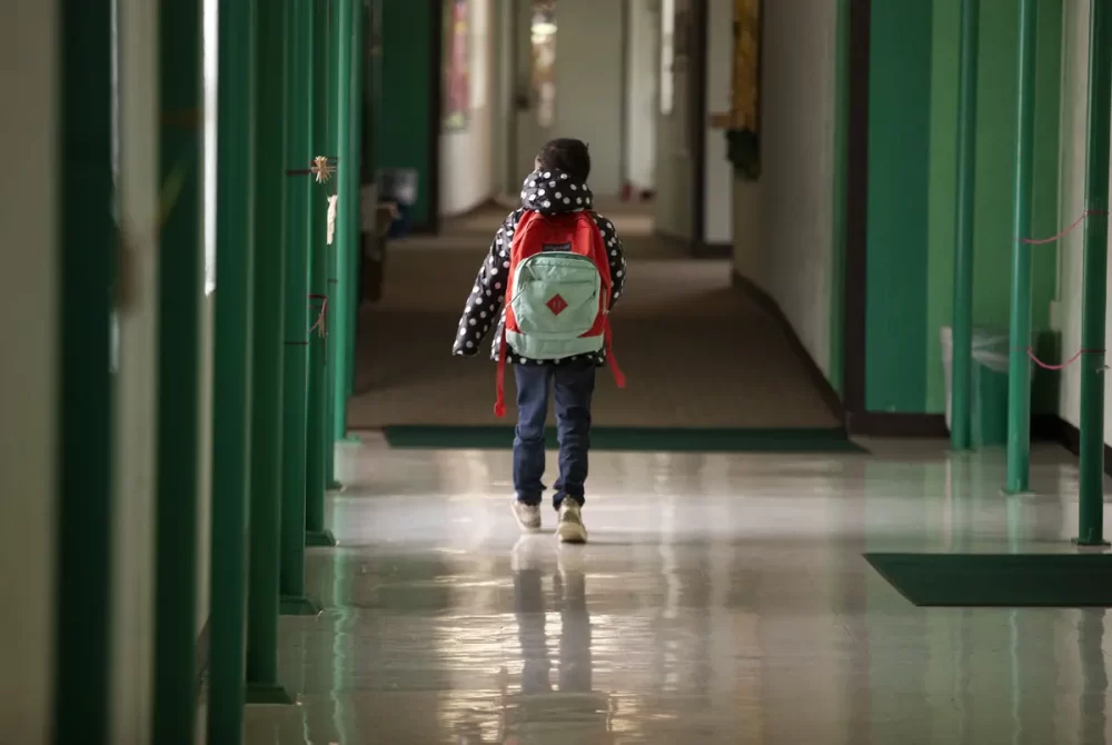A student walks down the hallway at Cactus Elementary School in Cactus in 2020. 