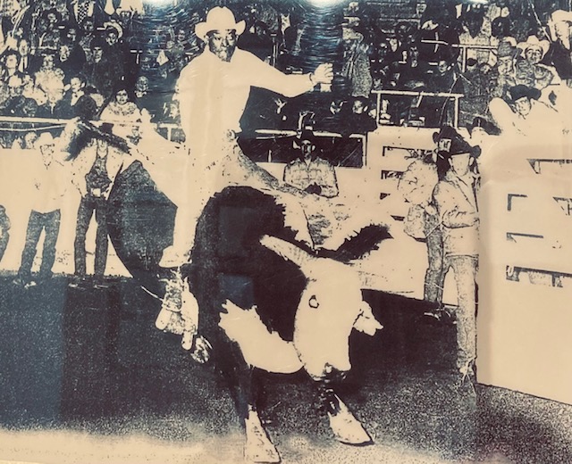Black rodeo legend Willie Thomas rides a bull