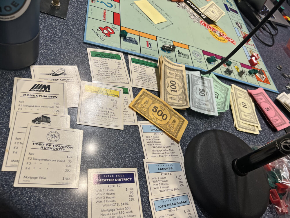 Michael Hagerty's Monopoly cash and properties pile up.