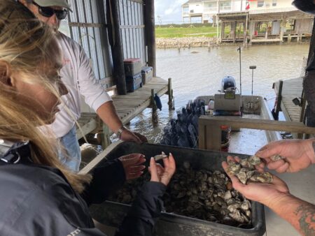 Hannah Kaplan is the founder of the Barrier Beauties oyster farm in Galveston. It's the second permitted oyster farm in the state.
