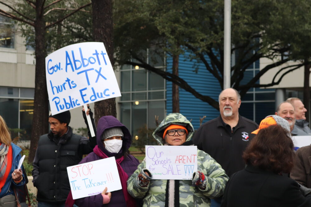 Protesters attend the Stop the HISD Takeover event outside of the HISD building. 