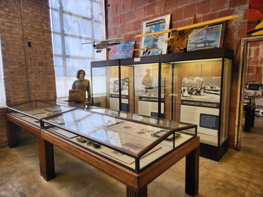 Photo of museum exhibit about women pilots in the 1940s