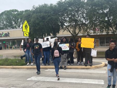 Protesters outside of Worthing High School in protest of the TEA takeover of HISD.