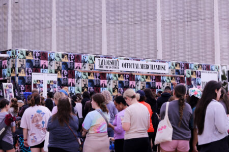 Taylor Swift fans line up for hours outside of NRG Stadium to grab merchandise from a pop-up truck, ahead of her three sold-out shows during her Houston stop in her Eras Tour.
