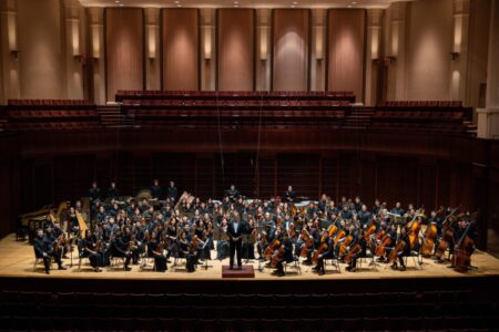 Photo of orchestra musicians on stage
