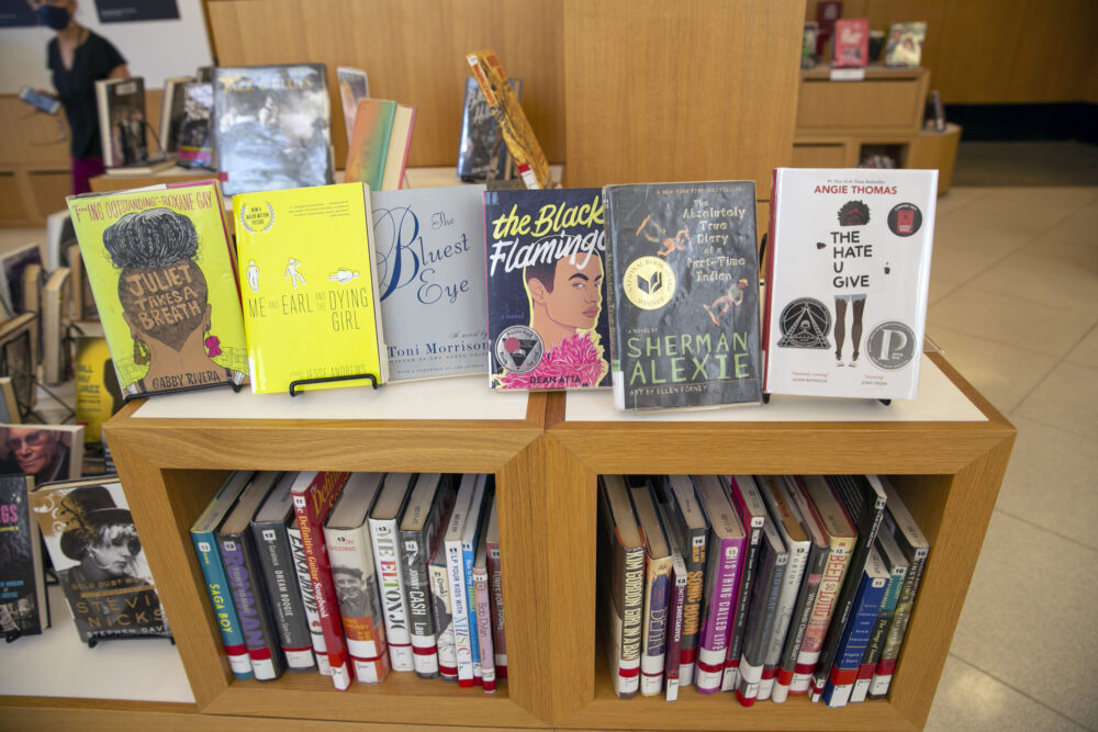Banned books are visible at the Central Library, a branch of the Brooklyn Public Library system, in New York City on Thursday, July 7, 2022. The books are banned in several public schools and libraries in the U.S., but young people can read digital versions from anywhere through the library. The Brooklyn Public Library offers free membership to anyone in the U.S. aged 13 to 21 who wants to check out and read books digitally in response to the nationwide wave of book censorship and restrictions. 