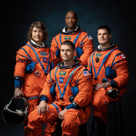 The crew of NASA’s Artemis II mission (left to right): NASA astronauts Christina Hammock Koch, Reid Wiseman (seated), Victor Glover, and Canadian Space Agency astronaut Jeremy Hansen