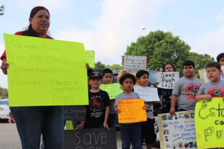 Nancy Coronado stands with protesters to oppose TEA's takeover of HISD.