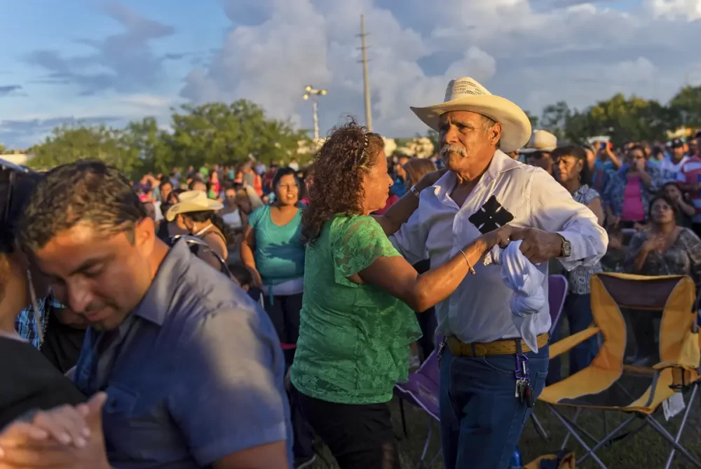 Luisa and Antonio Perez dance to the band Tigrillos at the Festival Viva Mexico in Corpus Christi on Sept. 8, 2013. 