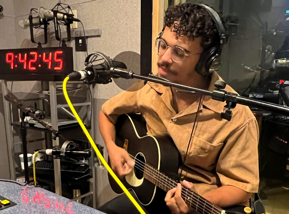 Houston musician Micah Edwards performs in the Houston Matters studio.