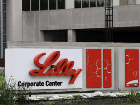 FILE - A sign for Eli Lilly & Co. sits outside their corporate headquarters in Indianapolis on April 26, 2017. The company said Wednesday, May 3, 2023, that its experimental Alzheimer’s drug appeared to slow worsening of the mind-robbing disease in a large study. (AP Photo/Darron Cummings, File)