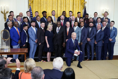 President Joe Biden poses for a photo during an event celebrating the 2022 World Series champion Houston Astros baseball team in the East Room of the White House, Monday, Aug. 7, 2023, in Washington.