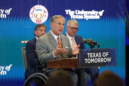 Gov. Greg Abbott speaks at a news conference announcing plans for two new hospitals on the UT Austin campus, including MD Anderson Cancer Center.
