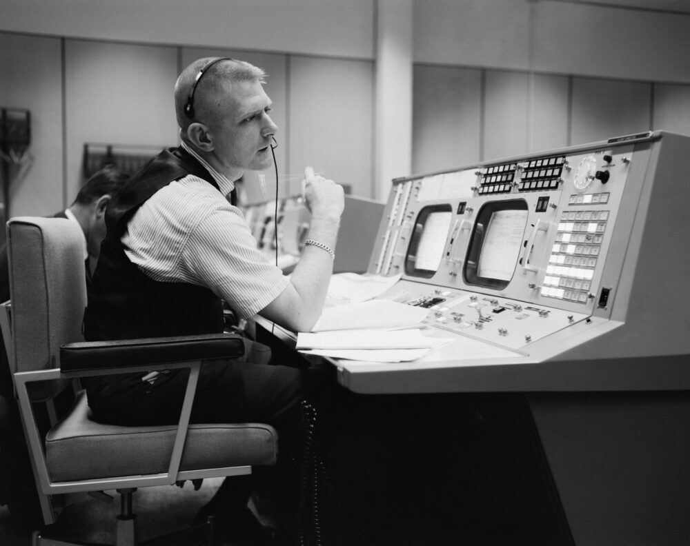 Gene Kranz at his console at NASA's Mission Control Center on May 30, 1965.