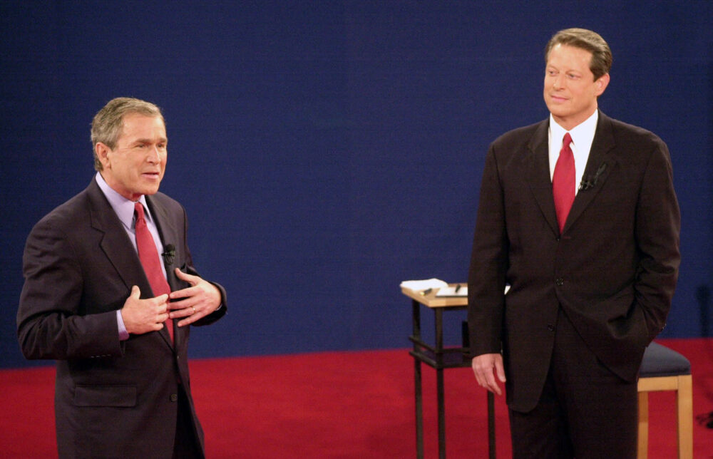 George W. Bush and Al Gore onstage during a Presidential debate in 2000.