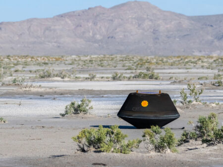 The sample return capsule from NASA’s OSIRIS-REx mission is seen shortly after touching down in the desert, Sunday, Sept. 24, 2023, at the Department of Defense's Utah Test and Training Range. The sample was collected from the asteroid Bennu in October 2020 by NASA’s OSIRIS-REx spacecraft. Photo Credit: (NASA/Keegan Barber)