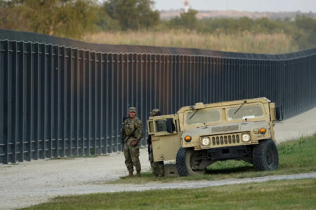 Members of the National Guard patrol near the border fence in Del Rio, Texas in 2021.