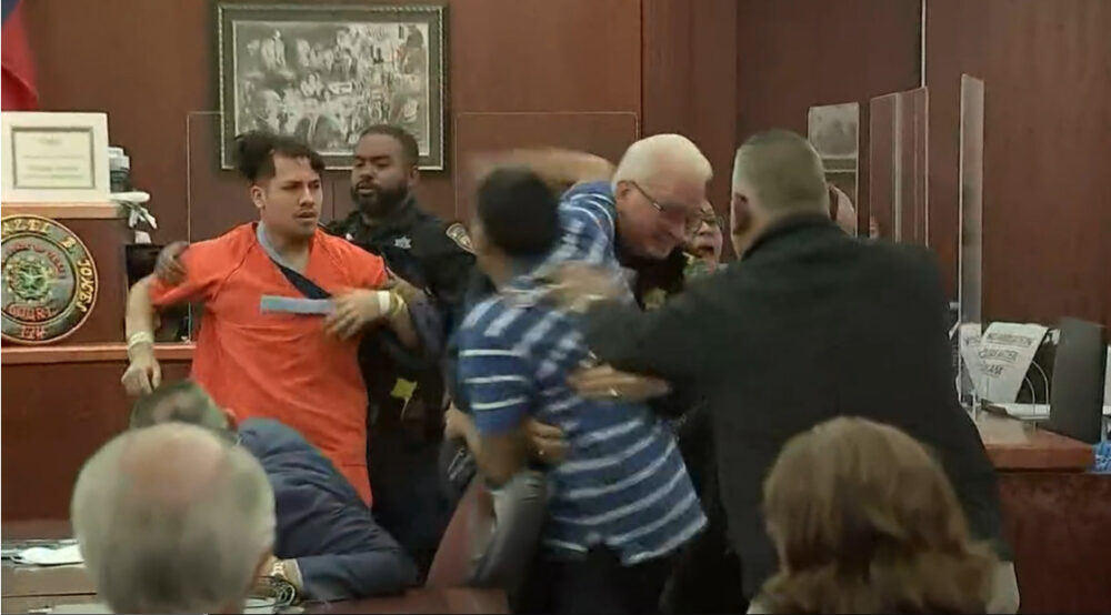 A fight broke out in a district court Tuesday minutes after Frank DeLeon Jr. pleaded guilty to the murder of Diamond Alvarez. (Screenshot from KHOU)