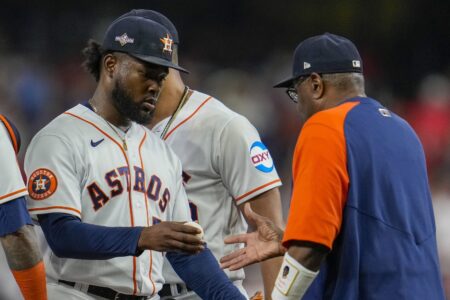 Houston Astros manager Dusty Baker takes starting pitcher Cristian Javier out of the game during the first inning of Game 6 of the baseball AL Championship Series against the Texas Rangers Monday, Oct. 23, 2023, in Houston. (AP Photo/Godofredo A. Vásquez)