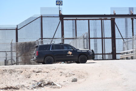 A Texas DPS vehicle sits at the border fence in El Paso on May 11, 2023
