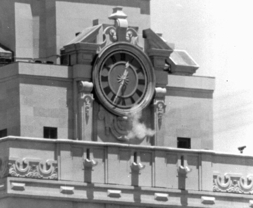 A cloud of smoke seen as a sniper fired from the tower of the University of Texas in Austin on Aug. 1, 1966, killing 16 people and injuring 31.