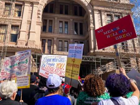 People gathered to protest school vouchers during a demonstration at the Texas Capitol.