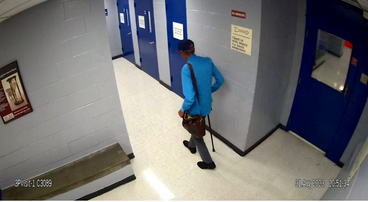 Security footage shows defense attorney Ronald Lewis inside the Harris County Jail. Lewis is accused of smuggling drug-laced papers into the facility.