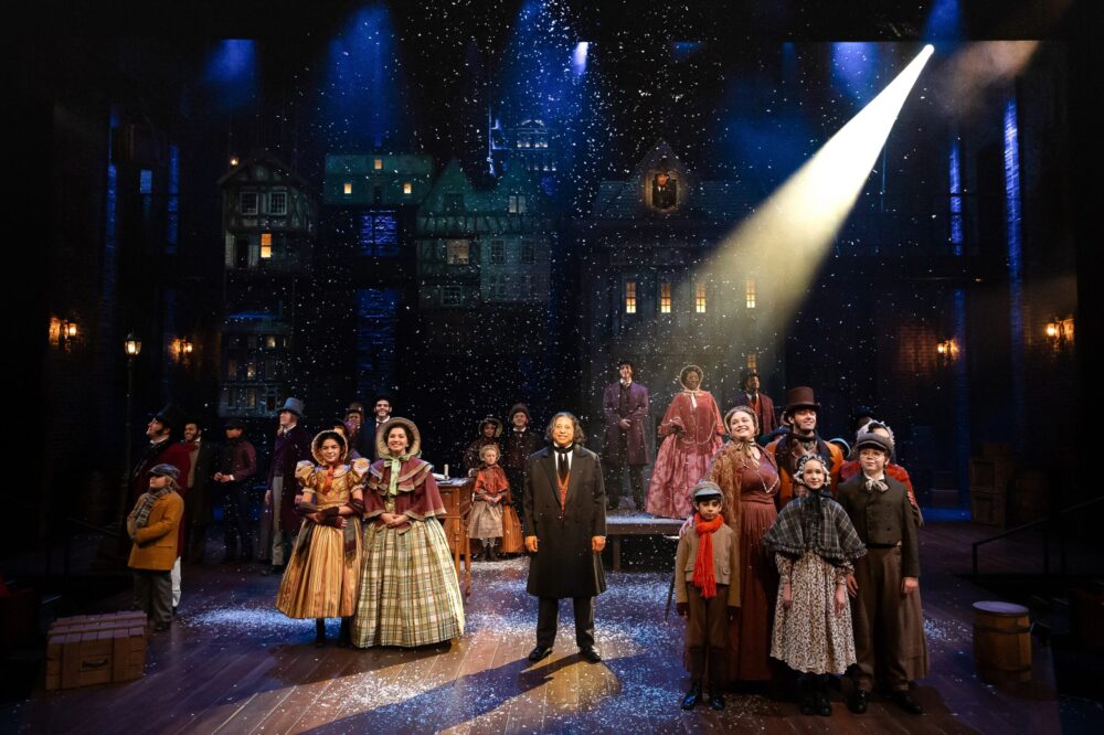 The cast of "A Christmas Carol" on stage at The Alley Theatre.