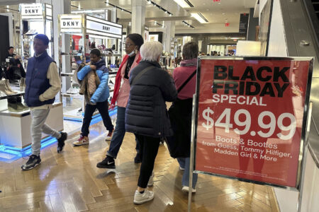 Black Friday shoppers walk through Macy's in Herald Square on Friday, Nov. 24, 2023, in New York.