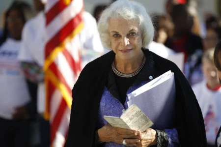 O’Connor holds a copy of the Constitution before a recitation of the preamble at the National Constitution Center on Sept. 16, 2011, in Philadelphia. The next day marked the 224th anniversary of the signing of the Constitution.