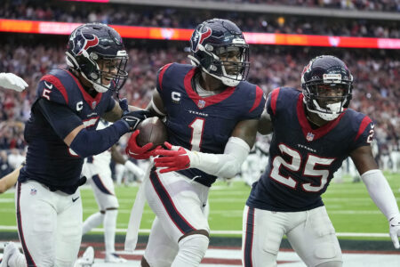 Texans safety Jimmie Ward celebrates a game-winning interception in the end zone.