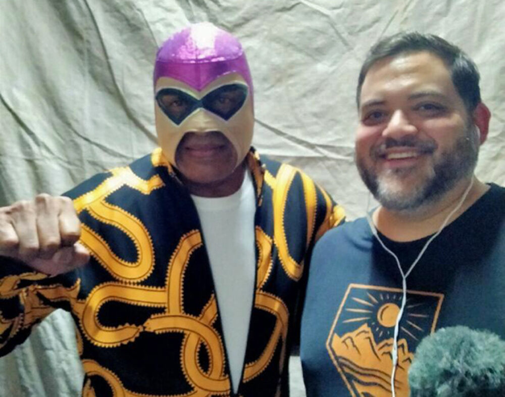 Famed Mexican wrestler Fantasma poses with Houston Matters producer Michael Hagerty