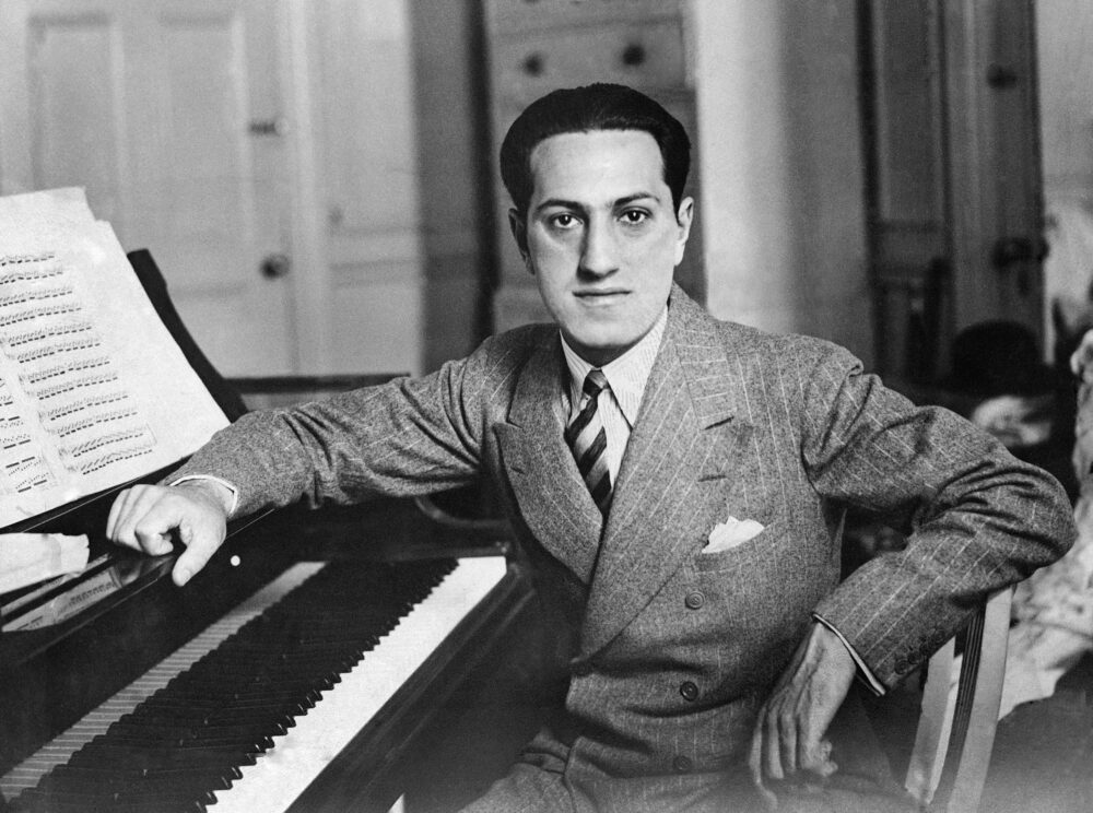 Composer George Gershwin at the piano
