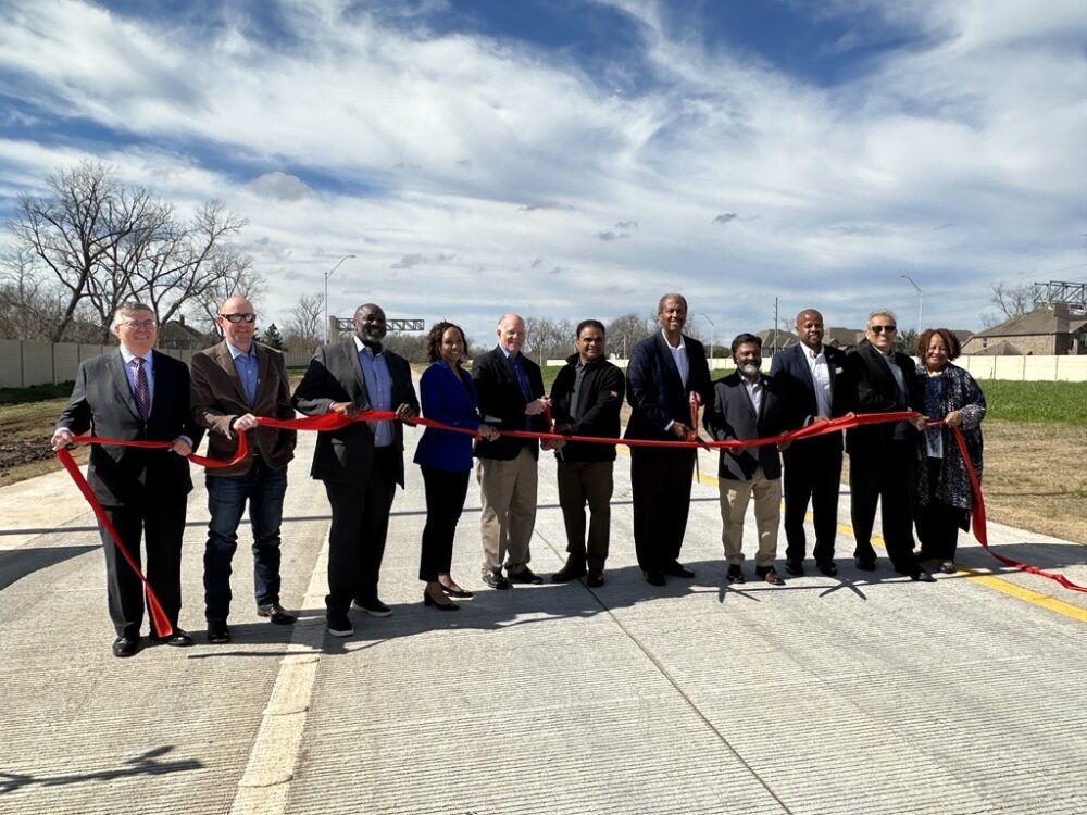Fort Bend officials cut a ribbon at the dedication ceremony for the Fort Bend Parkway extension to Sienna Ranch Road.