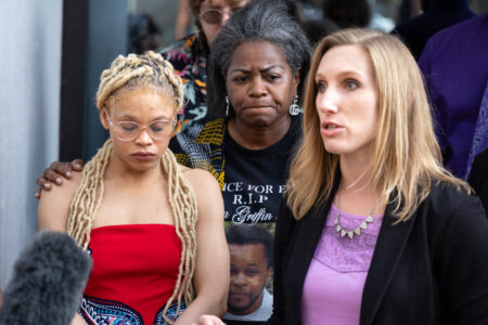 Mikayla Savage (left) stands alongside her attorney, Miriam Nemeth (right) during a press conference on Feb. 27, 2024.