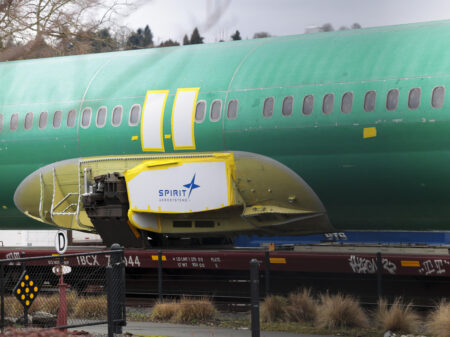 The Spirit AeroSystems logo is pictured on an unpainted 737 fuselage as Boeing's 737 factory teams hold the first day of a 