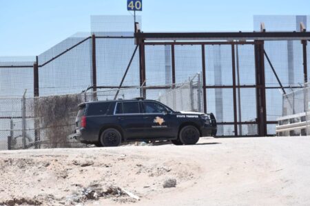 A Texas DPS vehicle sits at the border fence in El Paso on May 11, 2023.