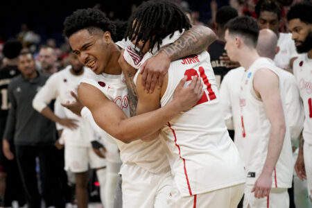 University of Houston players celebrate the team's overtime win over Texas A&M in the NCAA tournament.