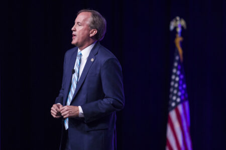 Texas Attorney General Ken Paxton, shown at the Republican Party of Texas convention in San Antonio in 2018, has cut a deal to have the securities fraud charges filed against him dropped.