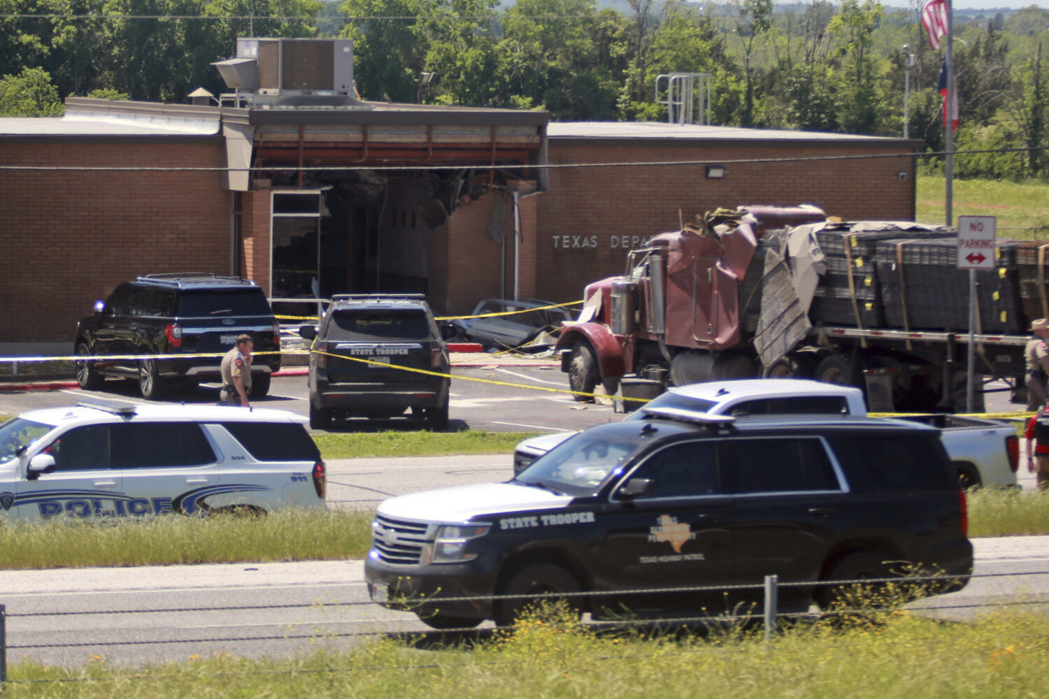 Stolen 18-wheeler crashes into Texas DPS office, killing one and injuring more than a dozen
