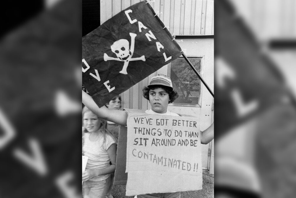 A boy protests the Love Canal environmental disaster