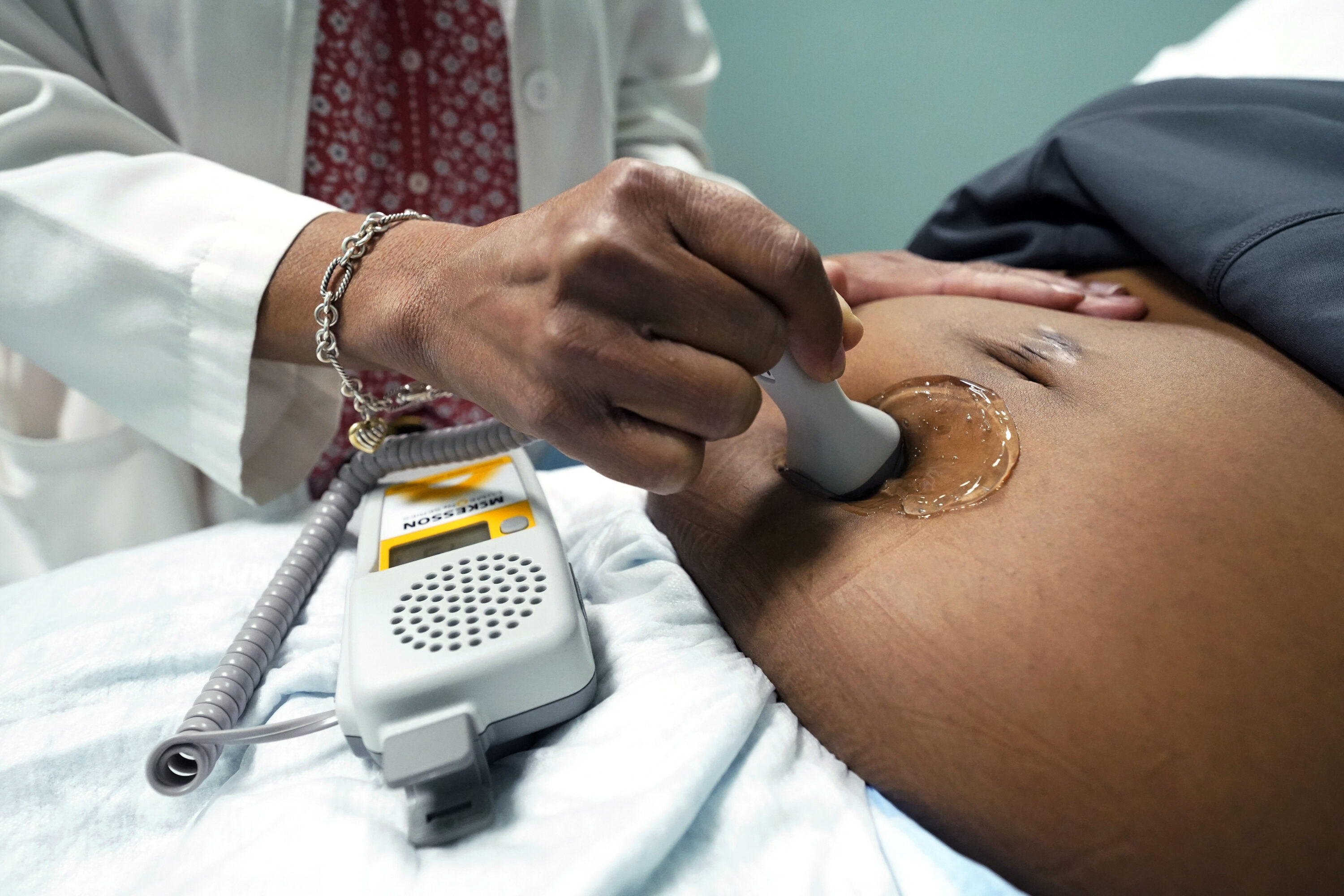A pregnant woman receives maternal health care