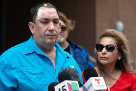 Adael Gonzalez-Garcia stands next to his girlfriend, Maura Nieto, as he talks about his experience in the Harris County Jail during a press conference on May 10, 2024. 