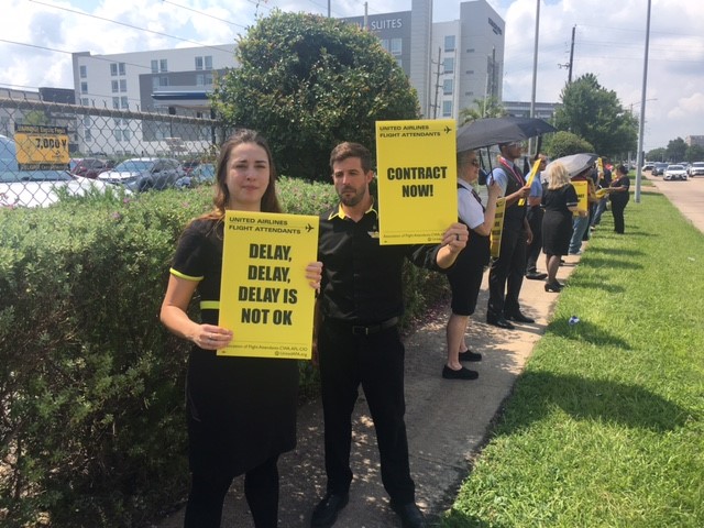 Read more about the article Houston flight attendants take to the streets to demand long-awaited contract – Houston Public Media