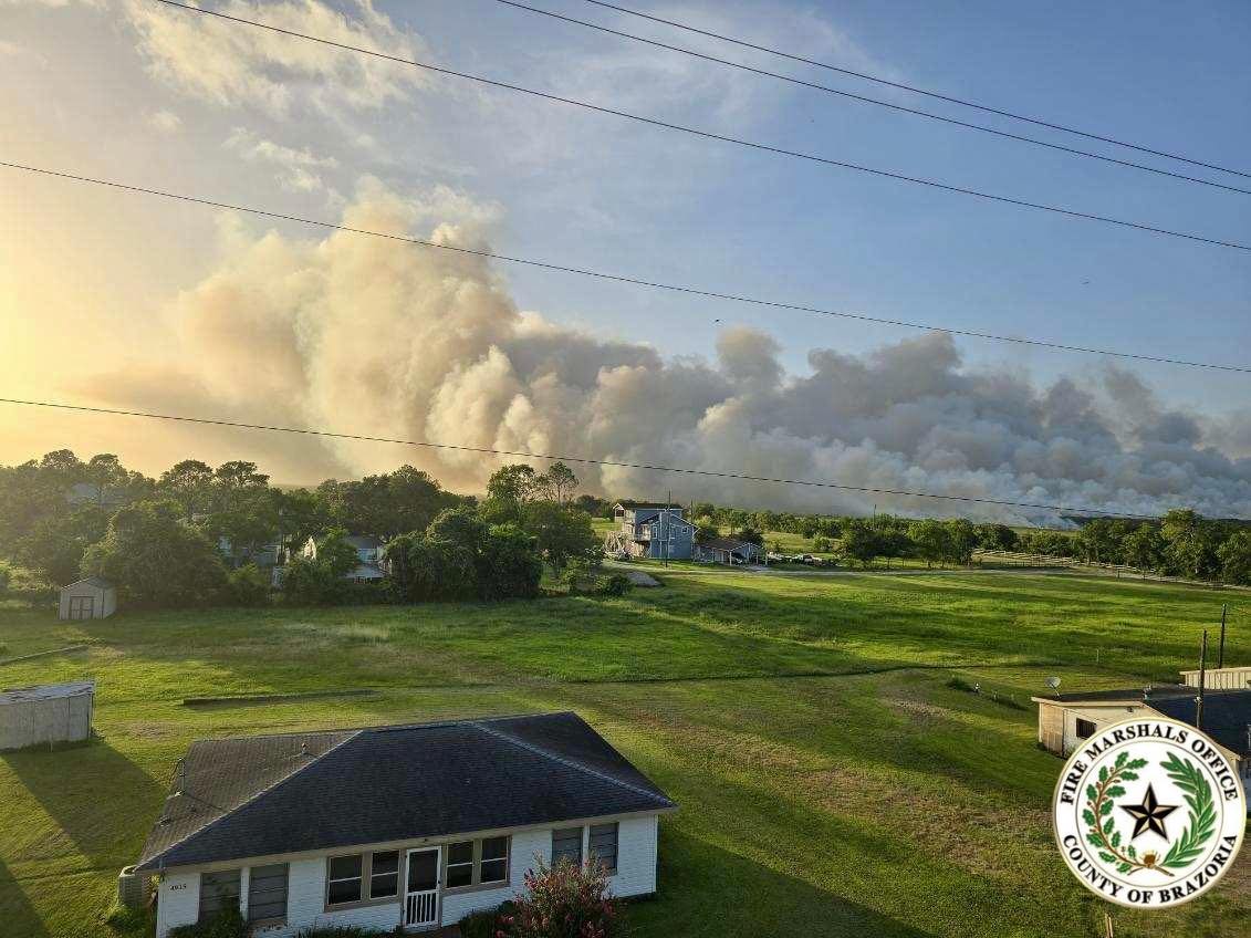 Crews work to contain large Brazoria County wildfire | Houston Public Media