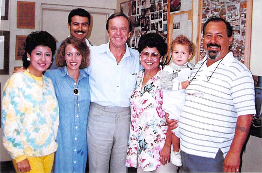 Carlos Villagomez (far right) and his family with astronaut Alan Shepard (center).