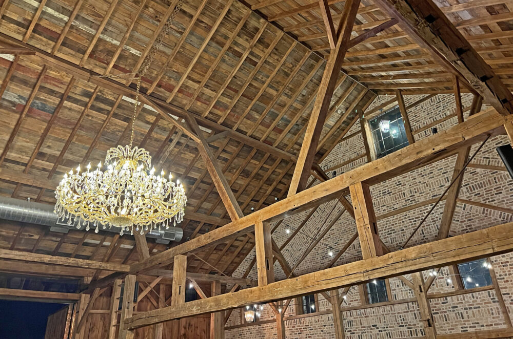 The ceiling and chandelier in the barn at Beckendorff Farms. (Photo Credit: Michael Hagerty/Houston Public Media)