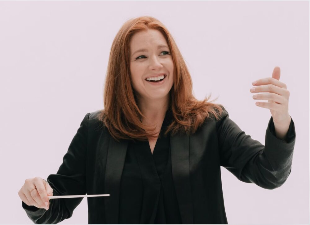 a woman conducting