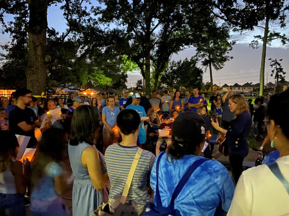 Candlelight vigil held for Houston ISD student, others lost in Central Texas floods | Houston Public Media