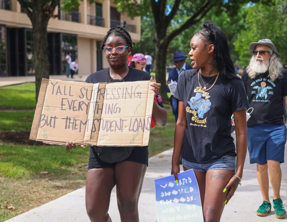 Before the hearing got underway, hundreds of demonstrators gathered for a rally in a park on the main UH campus. (Rob Salinas/Houston Public Media)